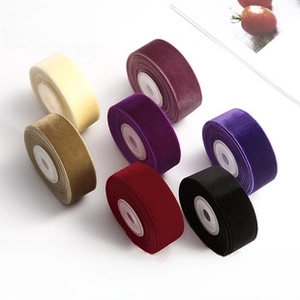 Detail of 25mm wide velvet ribbons in multiple colors for elegant gift packaging