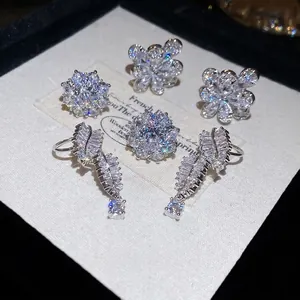 Sparkling zircon flower earrings and ring set in a premium jewelry box presentation