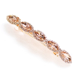 Sparkling gold hair clip with champagne marquise crystals and clear rhinestone accents