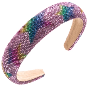 Detail of wide padded headband featuring sparkling rhinestones and colorful star patterns