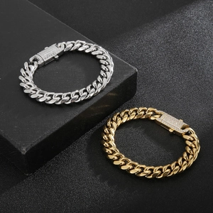 Hip hop style gold and silver Cuban link bracelets with iced out diamond claps for men