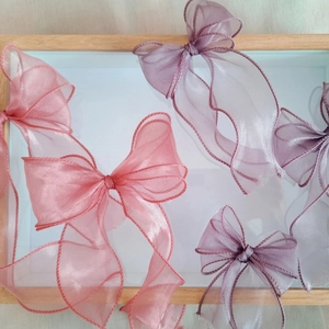 Pink and lavender organza butterfly hair bows for floral design and gift wrapping