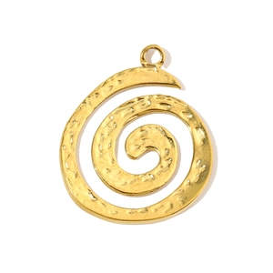 Detailed view of a golden spiral metal pendant with unique hammered texture and top ring hook