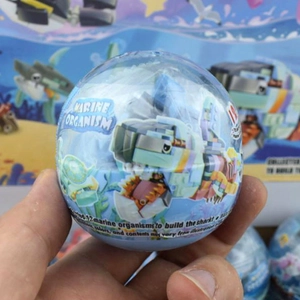 Close-up of marine organism building block capsule with a blue translucent shell