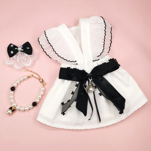 White pet wedding dress set with black bow, pearl necklace and hair accessory for dogs