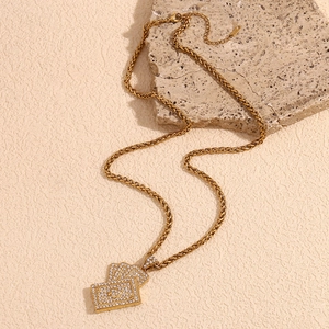 Detail of 18K gold-plated playing card pendant with zircons and twisted rope chain