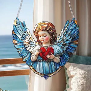 Close-up of colorful acrylic angel suncatcher with blue wings and red heart detail