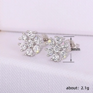 Elegant 9mm flower stud earrings with sparkling crystals in a silver-tone finish