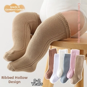 Detail of breathable hollow knit baby knee high socks in various colors for 0-2 years