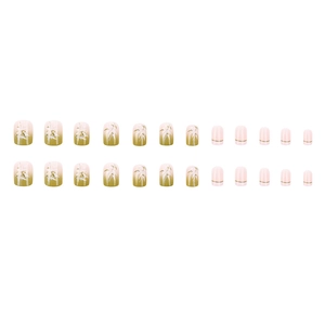 Short square press-on nails with green bamboo gradient and gold line accents