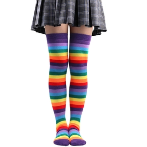 Detail showing the colorful rainbow stripe pattern on knitted over-knee thigh high socks