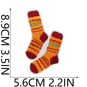 Detailed view of striped sock embroidery patch with 8.9cm by 5.6cm size measurements