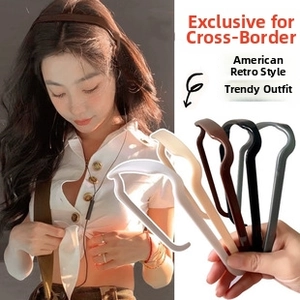 Detail view of five assorted matte flower hair claws for retro aesthetic styling