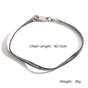 Detail of adjustable silver zipper chain necklace showing 42+5cm length and 36g weight