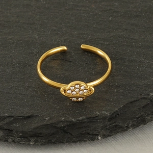 Adjustable 18k gold-plated planet ring with sparkling pave cubic zirconia on a stone base