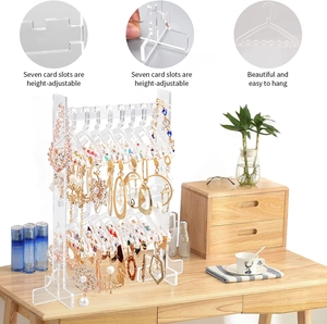 Acrylic earring stand with mini clothes hangers and seven adjustable height slots