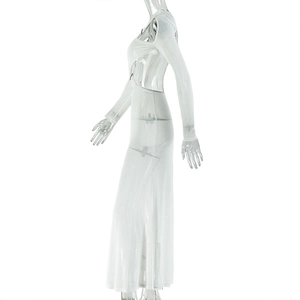 Detail of white long sleeve bodycon dress showing backless design and slim fit cut