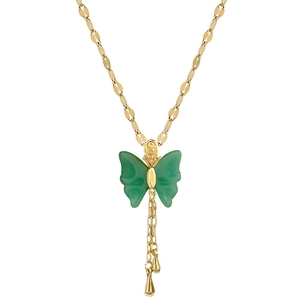 Gold plated butterfly necklace with green jade pendant and metallic tassels on white background