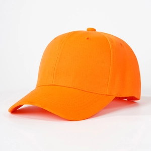 Detailed close-up of bright orange baseball cap with cotton twill texture and stitching