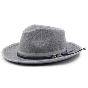 Detail of grey wool fedora hat with two-tone band and vintage metal buckle