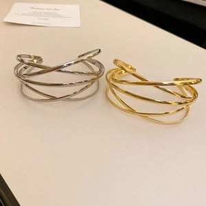 Minimalist multi-layer crisscross open cuff bracelets in polished gold and silver finish