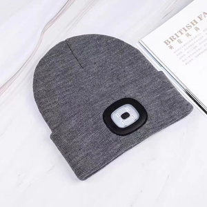 Gray knitted beanie with integrated LED light for nighttime running and outdoor use