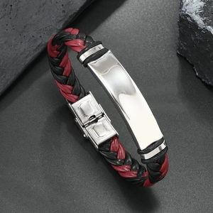 Detail of red and black braided leather bracelet with stainless steel silver clasp