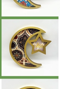 Detail of moon and star shaped golden trays with intricate geometric patterns and Arabic motifs