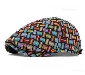 Detailed close-up showing the colorful woven jacquard pattern on a retro ivy flat cap