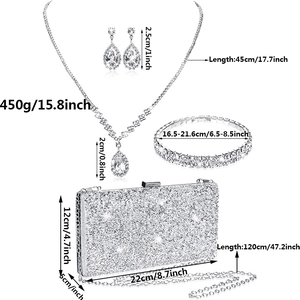 Sparkling rhinestone jewelry set with water drop necklace, earrings, and silver clutch bag