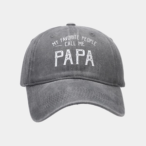 Detail of dark gray washed cotton baseball cap with vintage white PAPA text print