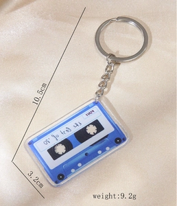 Retro acrylic cassette keychain with 80s theme measuring 10.5cm long and weighing 9.2g