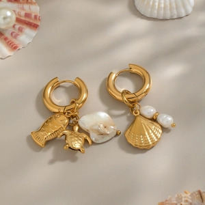 Golden titanium steel hoop earrings featuring natural pearls and ocean theme pendants