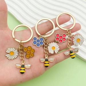 Cute honeybee keychain with colorful enamel honeycomb pendants and daisy charms