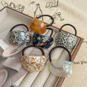 Set of 6 premium elastic hair ties with stylish resin semi-circle charms in amber patterns