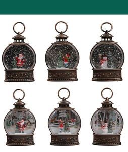 Detailed collection of vintage bronze Christmas lanterns with Santa and snowman scenes
