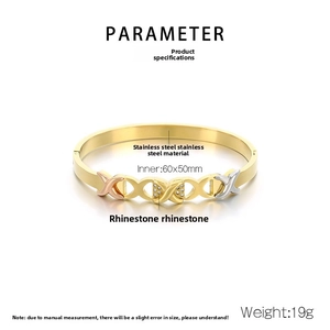 Detail of 18K gold plated stainless steel knot bracelet with tricolor interlocking X design