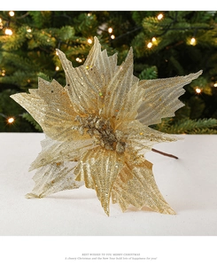 Detailed view of artificial golden Christmas flower with glitter texture and mesh petals