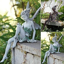 Detailed views of a resin fairy statue with wings in a natural garden setting