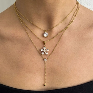 Three-layer gold titanium steel flower necklace with zircon pendants on neck