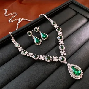 Luxury silver jewelry set with emerald green water drop stones and shimmering crystals