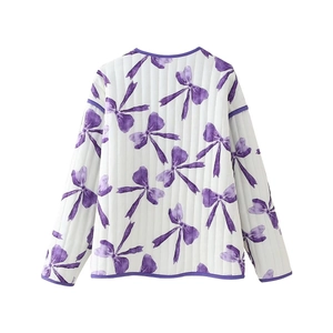 Quilted white jacket for women with purple bow prints and contrast piping detail
