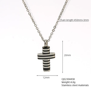 Detail view of titanium steel cross pendant necklace showing dimensions and silver-black stripes