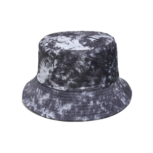 Detailed close-up of grey and white tie-dye cotton bucket hat with premium stitching