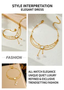 Detailed macro view of triple-layered gold anklet with shell flower and pearl accents