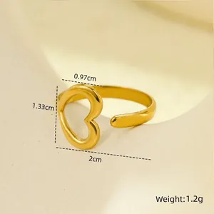 Detailed view of gold stainless steel heart ring with dimensions of 2cm by 1.33cm