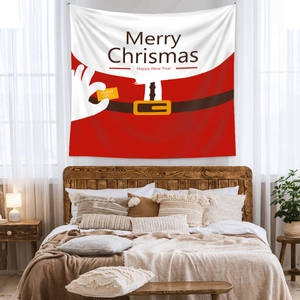 Cozy bedroom setting with Santa-themed Christmas tapestry hanging on a wooden headboard
