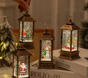Detail view of retro bronze Christmas lantern with Santa Claus and warm glowing light