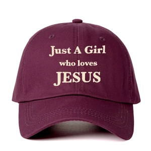 Burgundy baseball cap featuring Just A Girl who loves JESUS printed text on the front