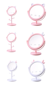 Detail of cute cat and rabbit ear makeup mirrors with built-in jewelry hooks